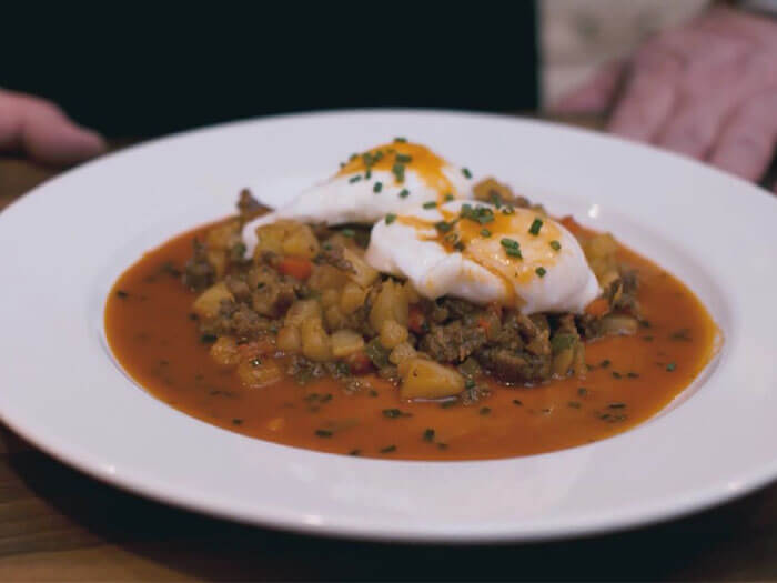 Poached Eggs with Chorizo Hash and Tequila Sauce